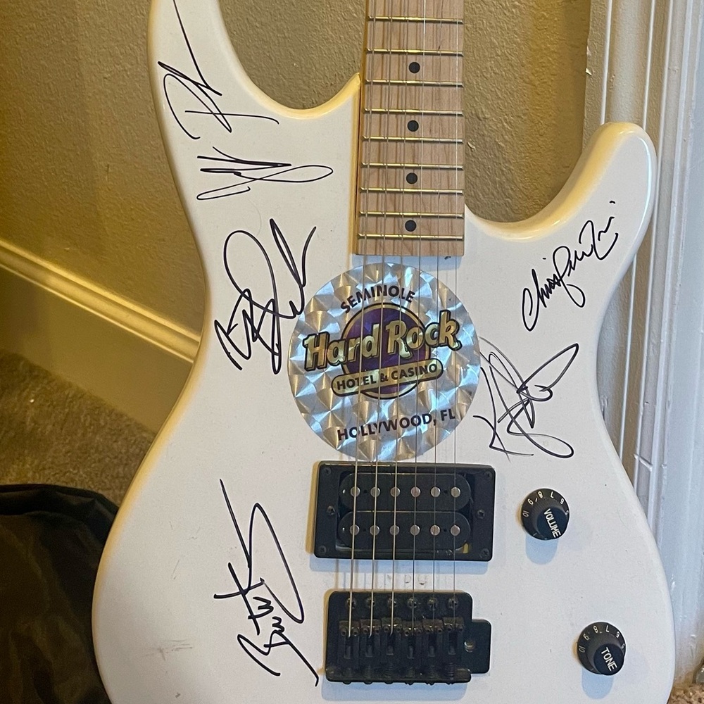 Foreigner signed guitar!   Won it at an auction-  Non smoking home.